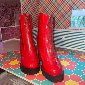 Red “leather” Dolls Kill zip front o ring boots size 6